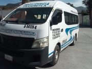 Infracción de transporte público por cruzar semáforo en rojo
